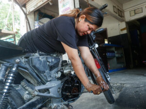 With Oil-Stained Clothes and a Wrench, This Nepali Woman Breaks Social Norms