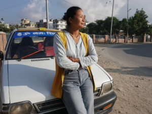She’s Driving Change as a Taxi Driver on Nepal’s Busiest Streets