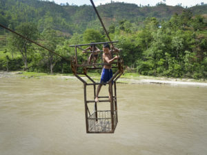 Perilous Pulley Transport on Nepal Rivers To Be Rendered Obsolete by Planned Bridges
