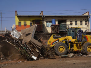 Traders Face Uncertain Future as Demolitions Surge